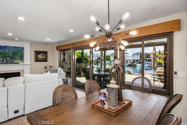 Dining room, Fireplace, Interior, Living room, Pendant Lights, Recessed Lighting, Wood Texture Flooring