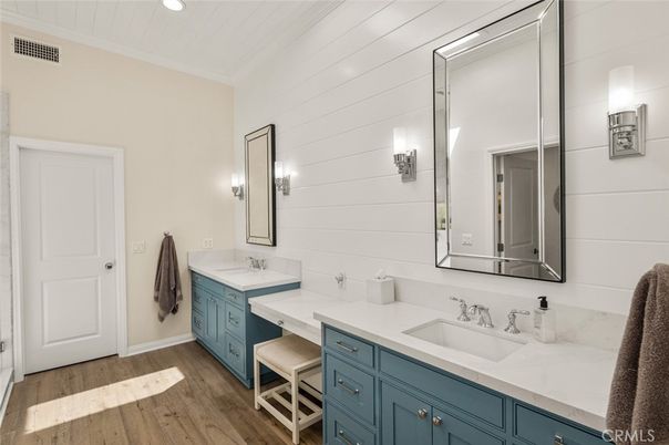 Bathroom, Dual Sink Vanities, Interior, Recessed Lighting, Wood Texture Flooring