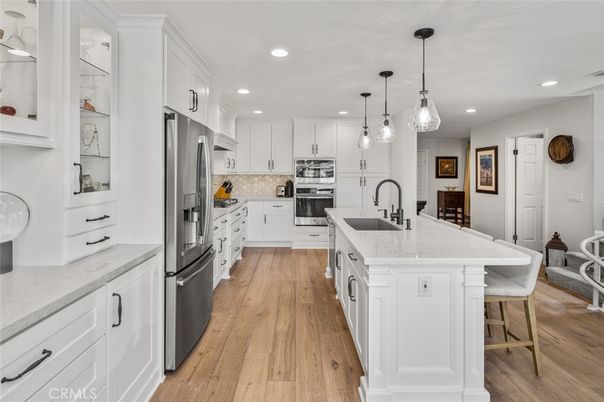 Interior, Kitchen, Pendant Lights, Recessed Lighting, Stainless Steel Appliances, Wood Texture Flooring