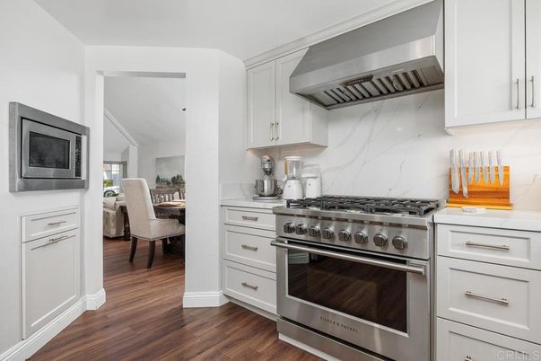 Interior, Kitchen, Marble Walls, Stainless Steel Appliances, Wood Texture Flooring