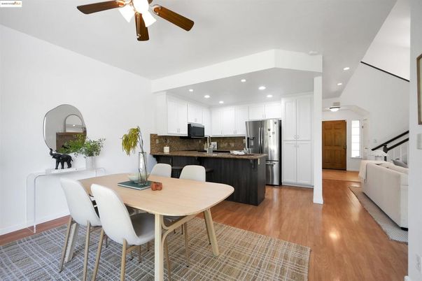 Dining room, Interior, Kitchen, Recessed Lighting, Stainless Steel Appliances, Wood Texture Flooring