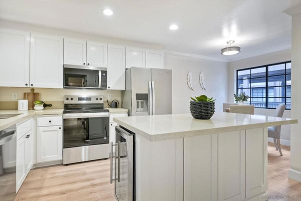 Dining room, Interior, Kitchen, Recessed Lighting, Stainless Steel Appliances, Wood Texture Flooring