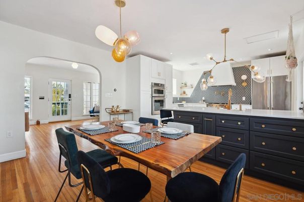 Dining room, Interior, Kitchen, Pendant Lights, Recessed Lighting, Stainless Steel Appliances, Wood Texture Flooring