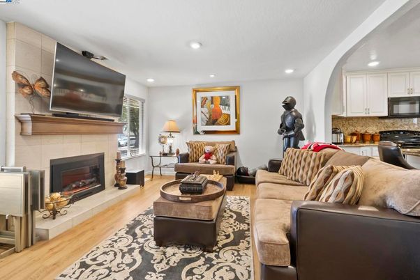 Fireplace, Interior, Kitchen, Living room, Recessed Lighting, Wood Texture Flooring