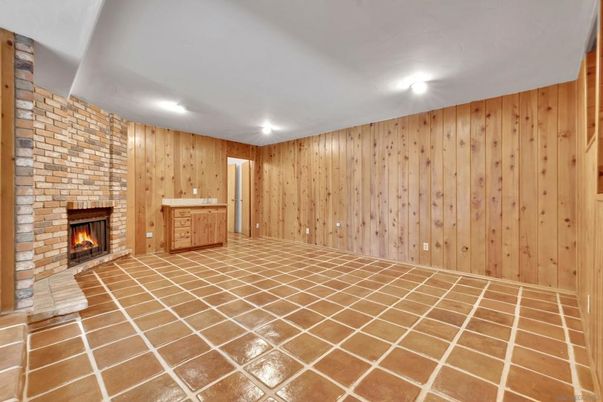 Empty room, Fireplace, Interior, Recessed Lighting, Stone Walls, Wooden Walls