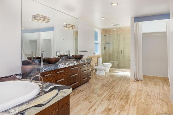 Bathroom, Dual Sink Vanities, Glass Shower, Interior, Recessed Lighting, Wood Texture Flooring
