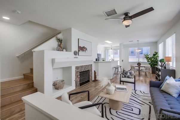 Dining room, Fireplace, Interior, Living room, Pendant Lights, Recessed Lighting, Wood Texture Flooring