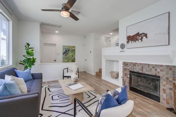 Fireplace, Interior, Living room, Recessed Lighting, Stone Walls, Wood Texture Flooring
