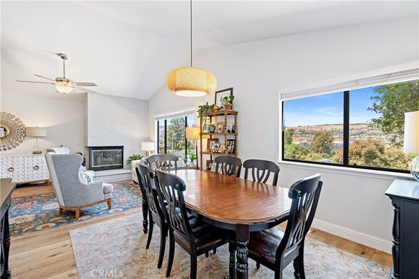 Dining room, Fireplace, Interior, Pendant Lights, Wood Texture Flooring