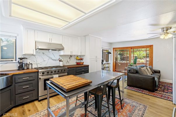 Interior, Kitchen, Marble Walls, Stainless Steel Appliances, Wood Texture Flooring