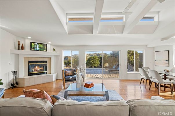 Dining room, Fireplace, Interior, Living room, Recessed Lighting, Wood Texture Flooring