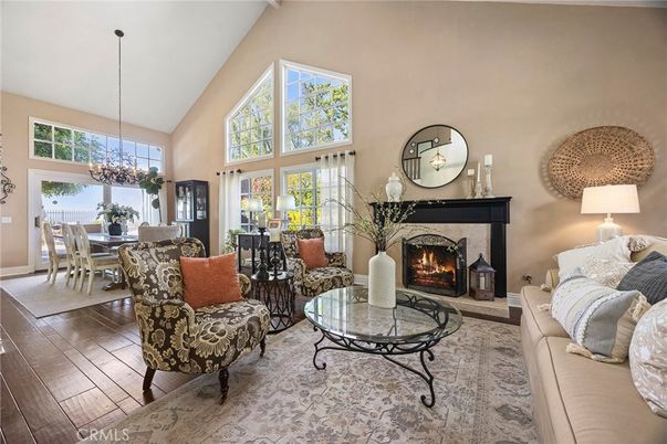 Chandelier, Dining room, Fireplace, Interior, Living room, Pendant Lights, Wood Texture Flooring