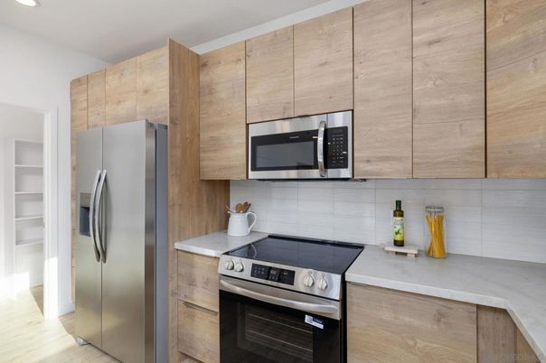 Interior, Kitchen, Recessed Lighting, Stainless Steel Appliances, Wood Texture Flooring
