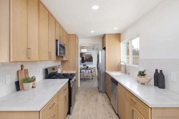 Dining room, Interior, Kitchen, Recessed Lighting, Stainless Steel Appliances, Wood Texture Flooring