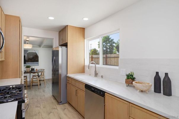 Dining room, Interior, Kitchen, Recessed Lighting, Stainless Steel Appliances, Wood Texture Flooring