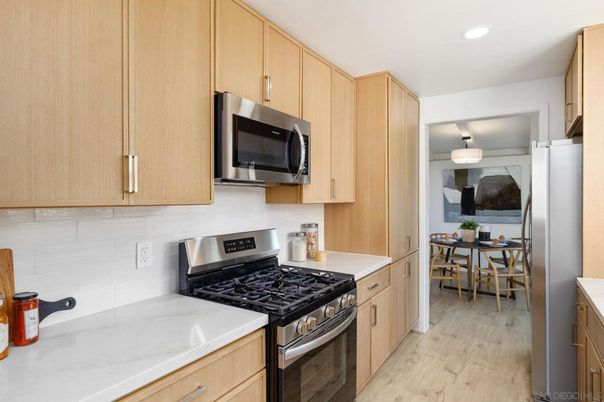 Dining room, Interior, Kitchen, Recessed Lighting, Stainless Steel Appliances, Wood Texture Flooring