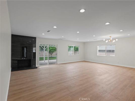 Empty room, Fireplace, Interior, Recessed Lighting, Wood Texture Flooring