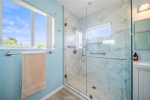 Bathroom, Glass Shower, Interior, Marble Walls, Wood Texture Flooring