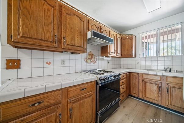 Interior, Kitchen, Tile Countertops, Wood Texture Flooring