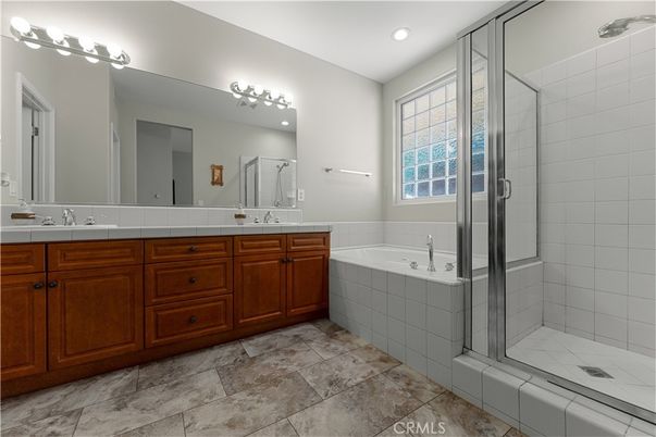 Bathroom, Dual Sink Vanities, Glass Shower, Interior, Recessed Lighting, Tile Countertops