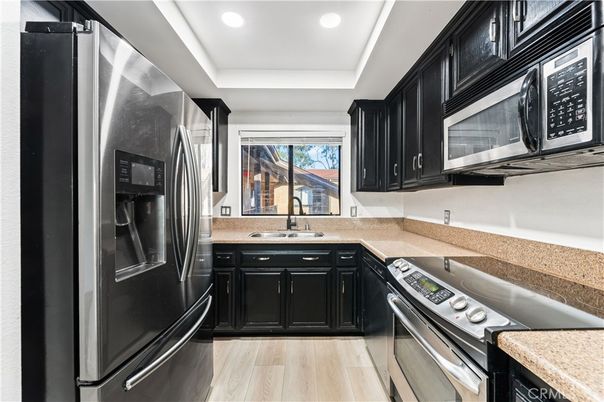 Interior, Kitchen, Recessed Lighting, Stainless Steel Appliances, Wood Texture Flooring