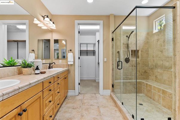 Bathroom, Dual Sink Vanities, Glass Shower, Interior, Recessed Lighting, Tile Countertops