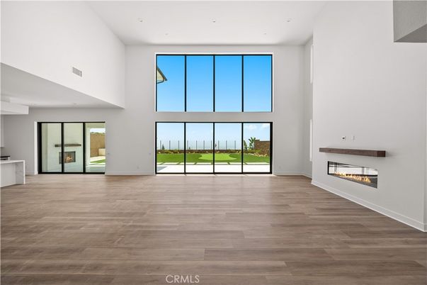 Empty room, Fireplace, Interior, Recessed Lighting, Wood Texture Flooring