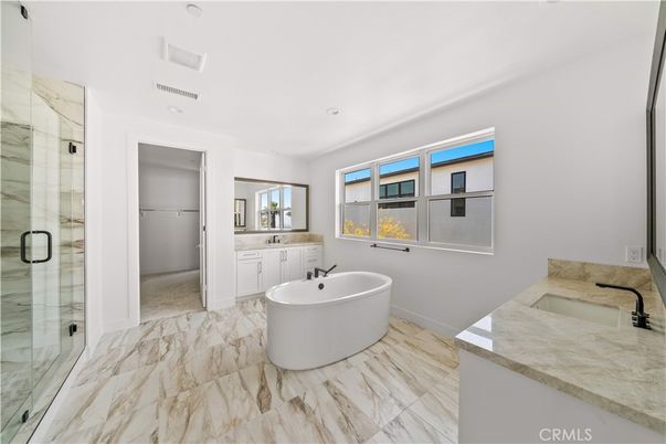 Bathroom, Dual Sink Vanities, Free Standing Baths, Glass Shower, Interior, Marble, Recessed Lighting