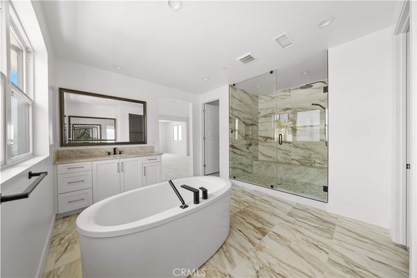 Bathroom, Free Standing Baths, Glass Shower, Interior, Marble, Marble Walls, Recessed Lighting