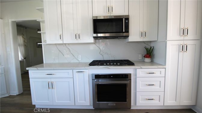 Interior, Kitchen, Marble Walls, Stainless Steel Appliances, Wood Texture Flooring