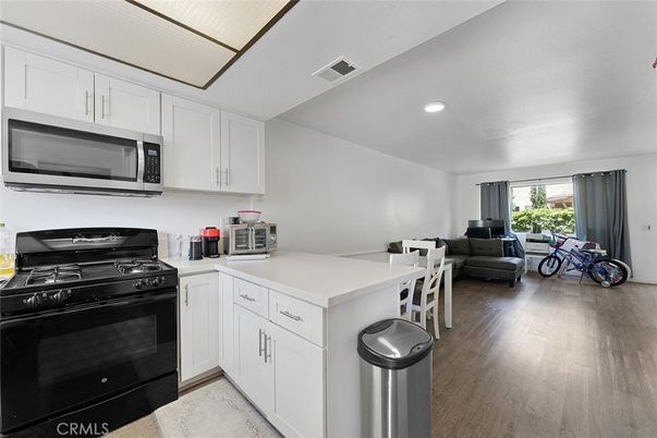 Interior, Kitchen, Living room, Recessed Lighting, Stainless Steel Appliances, Wood Texture Flooring