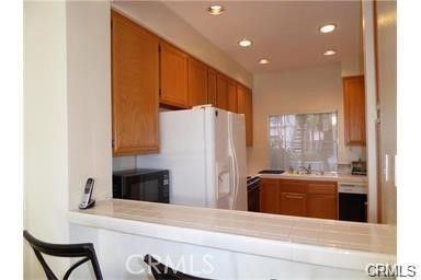 Interior, Kitchen, Recessed Lighting, Tile Countertops