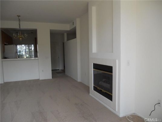Chandelier, Empty room, Fireplace, Interior