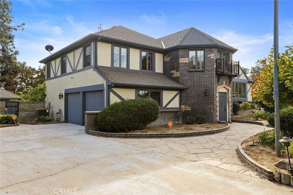 Attached, Exterior, Facade, Brick Facade, Tudor Revival