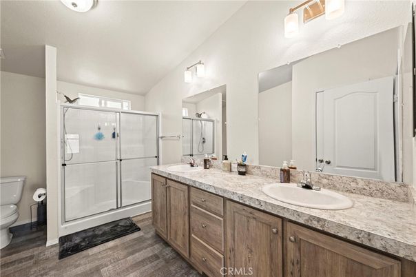 Bathroom, Dual Sink Vanities, Glass Shower, Interior, Wood Texture Flooring