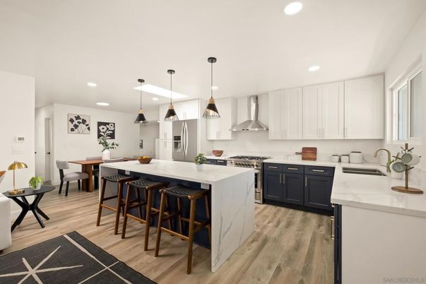 Dining room, Interior, Kitchen, Pendant Lights, Recessed Lighting, Stainless Steel Appliances, Wood Texture Flooring