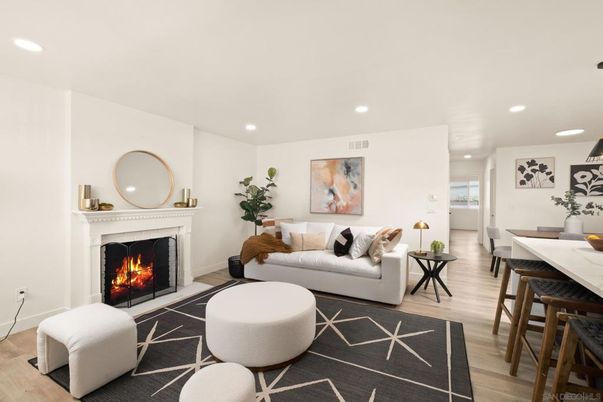 Dining room, Fireplace, Interior, Living room, Recessed Lighting, Wood Texture Flooring