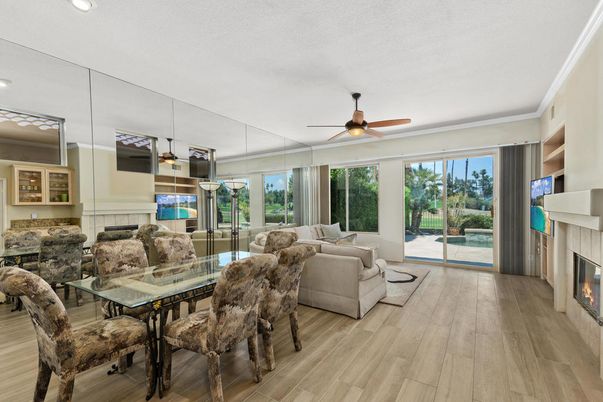 Dining room, Fireplace, Interior, Living room, Recessed Lighting, Wood Texture Flooring