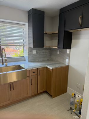 Interior, Kitchen, Marble Walls, Stainless Steel Appliances, Wood Texture Flooring