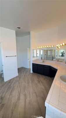 Bathroom, Dual Sink Vanities, Interior, Tile Countertops, Wood Texture Flooring
