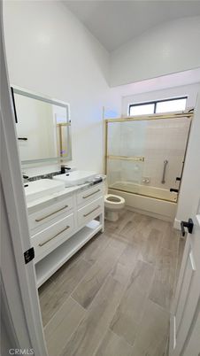 Bathroom, Dual Sink Vanities, Glass Shower, Interior, Wood Texture Flooring