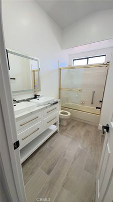 Bathroom, Dual Sink Vanities, Glass Shower, Interior, Wood Texture Flooring