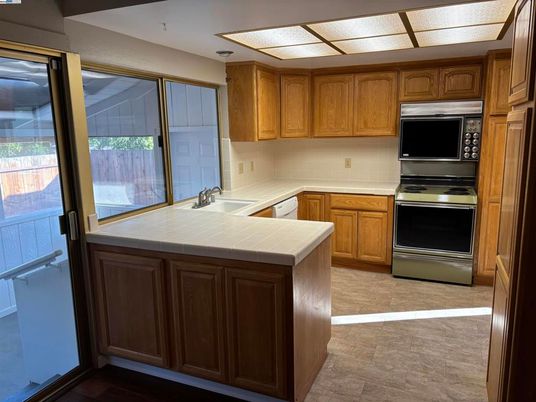 Interior, Kitchen, Stainless Steel Appliances, Tile Countertops