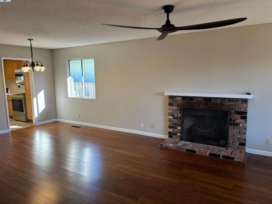 Empty room, Fireplace, Interior, Pendant Lights, Wood Texture Flooring