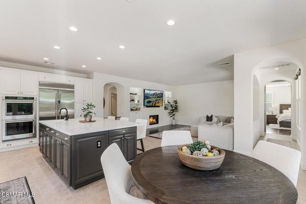 Dining room, Fireplace, Interior, Kitchen, Living room, Recessed Lighting, Stainless Steel Appliances