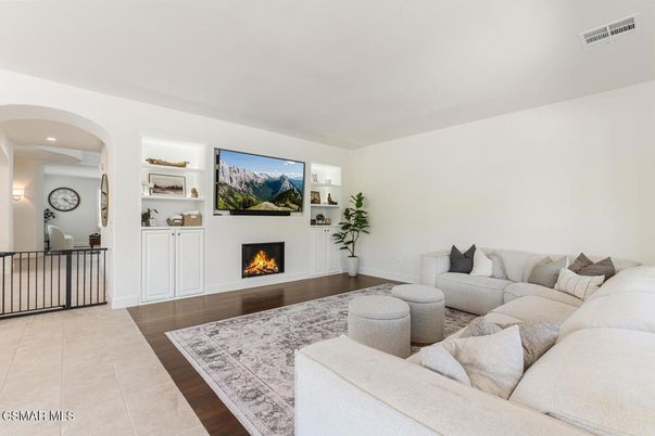 Fireplace, Interior, Living room, Recessed Lighting, Wood Texture Flooring