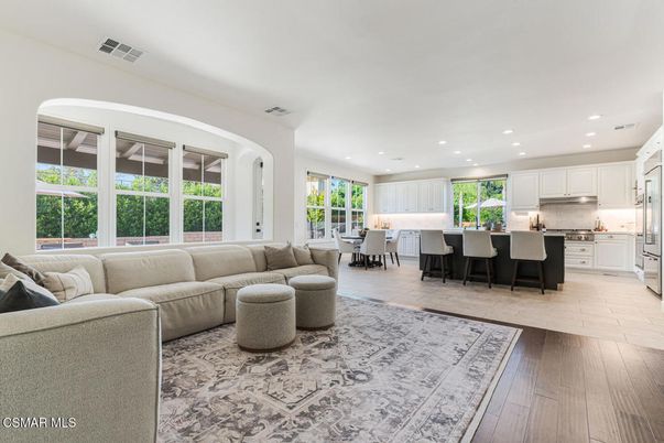 Dining room, Interior, Kitchen, Living room, Recessed Lighting, Stainless Steel Appliances, Wood Texture Flooring