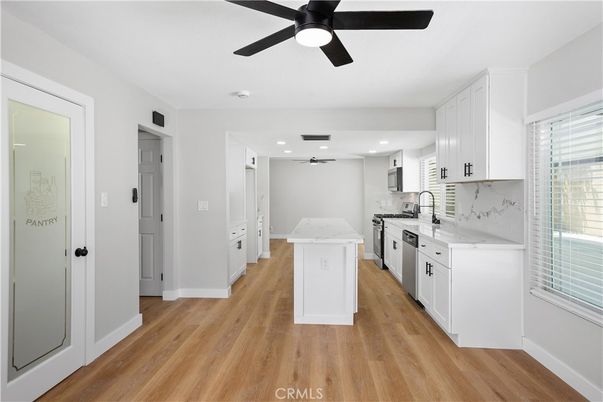 Interior, Kitchen, Marble Walls, Recessed Lighting, Wood Texture Flooring