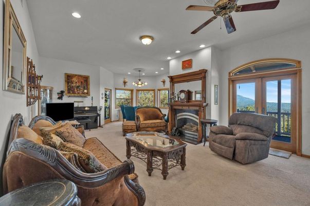 Chandelier, Fireplace, Interior, Living room, Piano, Recessed Lighting