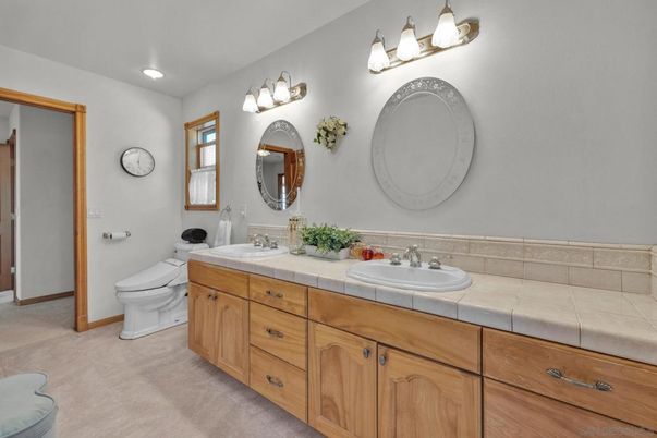 Bathroom, Dual Sink Vanities, Interior, Recessed Lighting, Tile Countertops